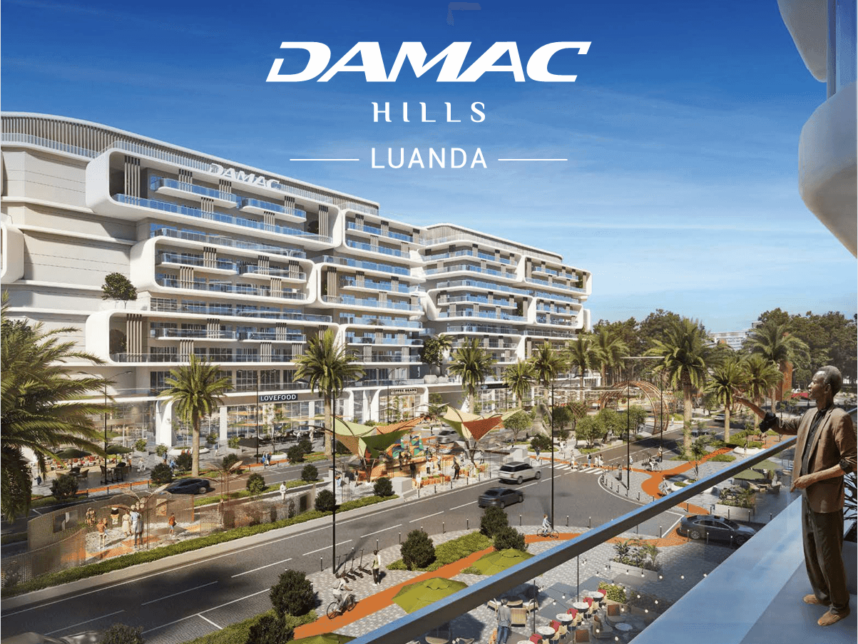 Modern architecture of DAMAC Hills Luanda with palm trees and a busy street in the foreground.