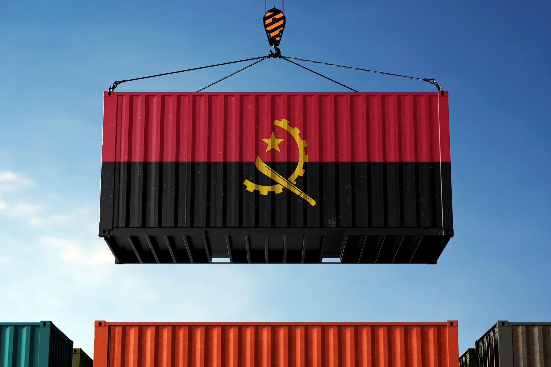 Shipping container with Angola flag being lifted by crane in the sky, with other containers stacked below.
