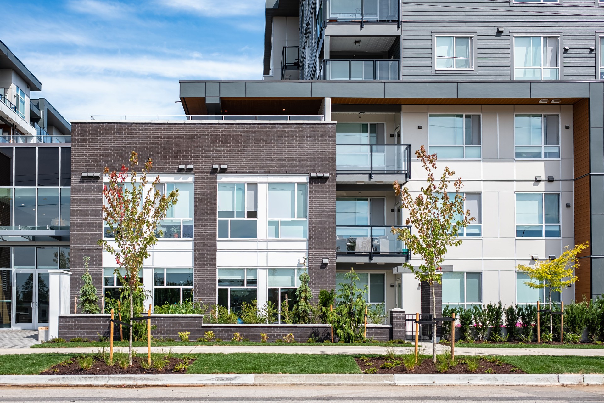 New Modern Apartment Buildings in Vancouver BC. Canadian modern residential architecture on sunny day